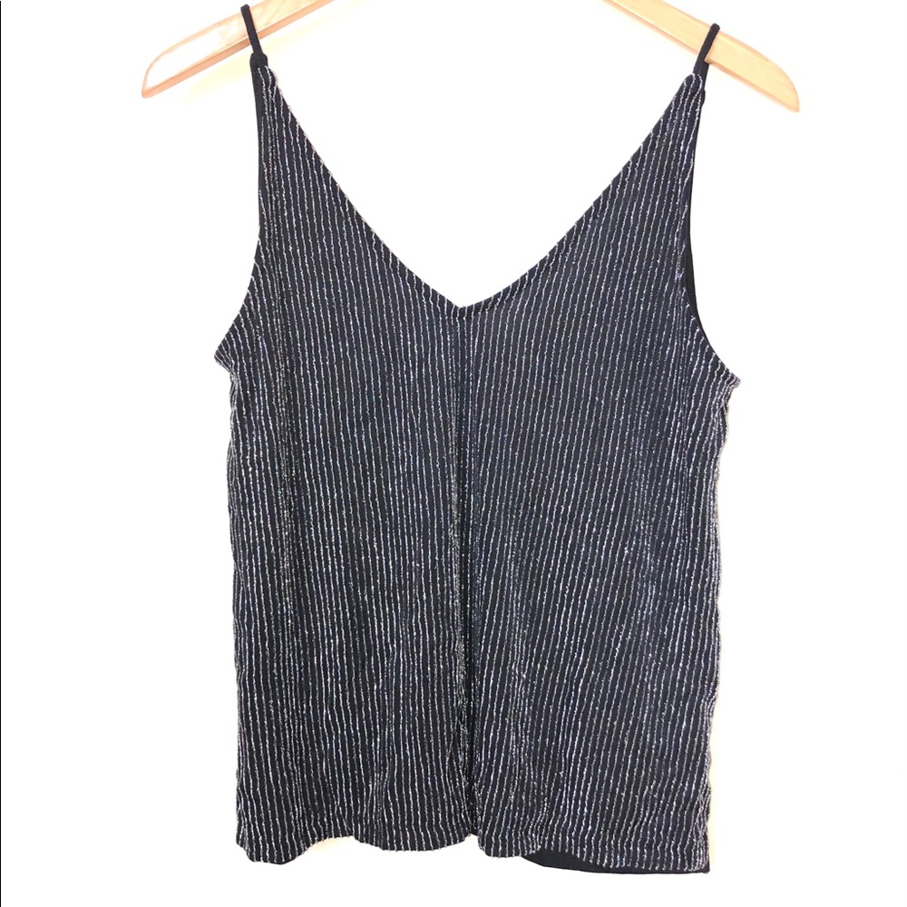 As new! Glittery top.